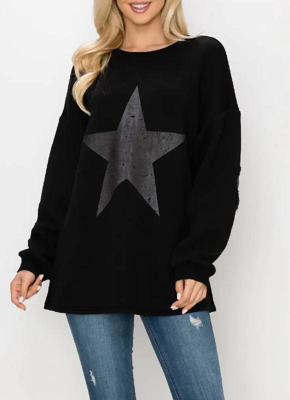 Finola Pointe Knit Star Top In Black